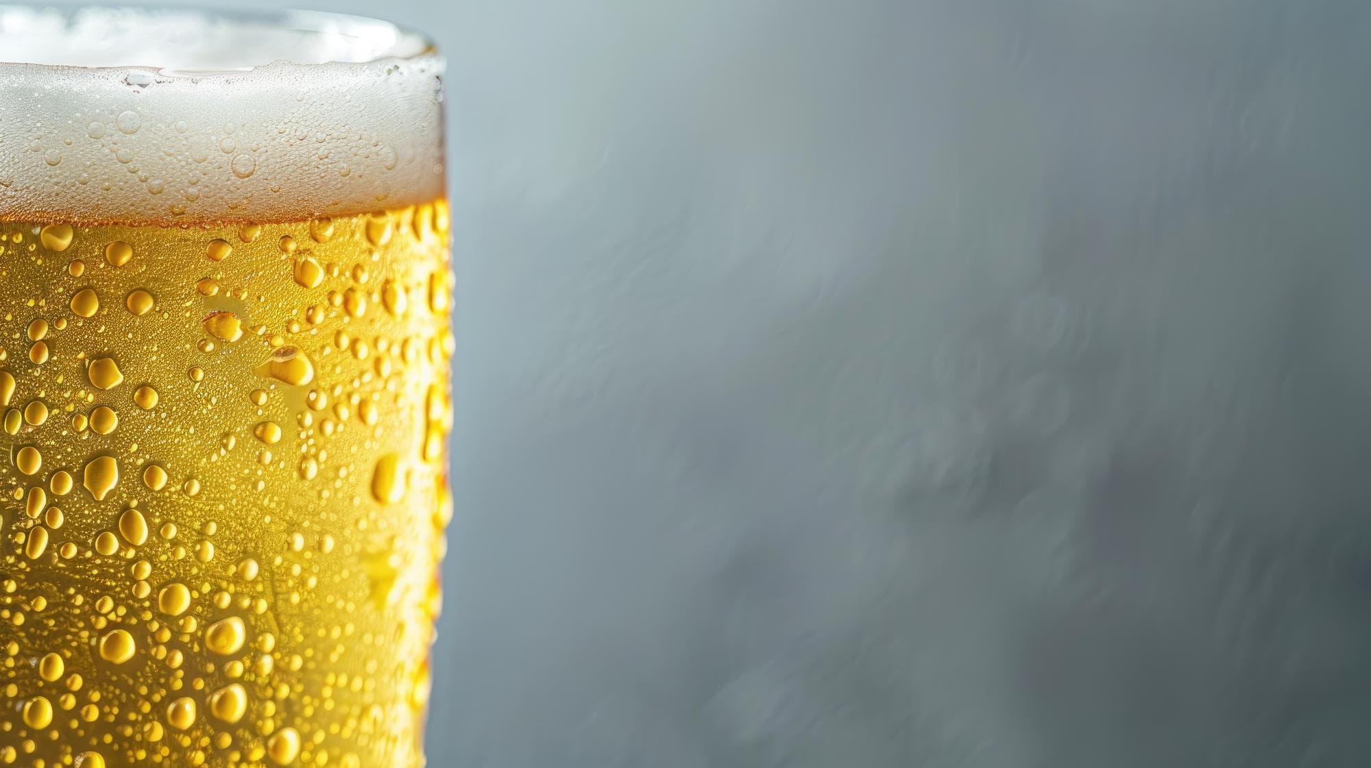 Cold beer glass with condensation