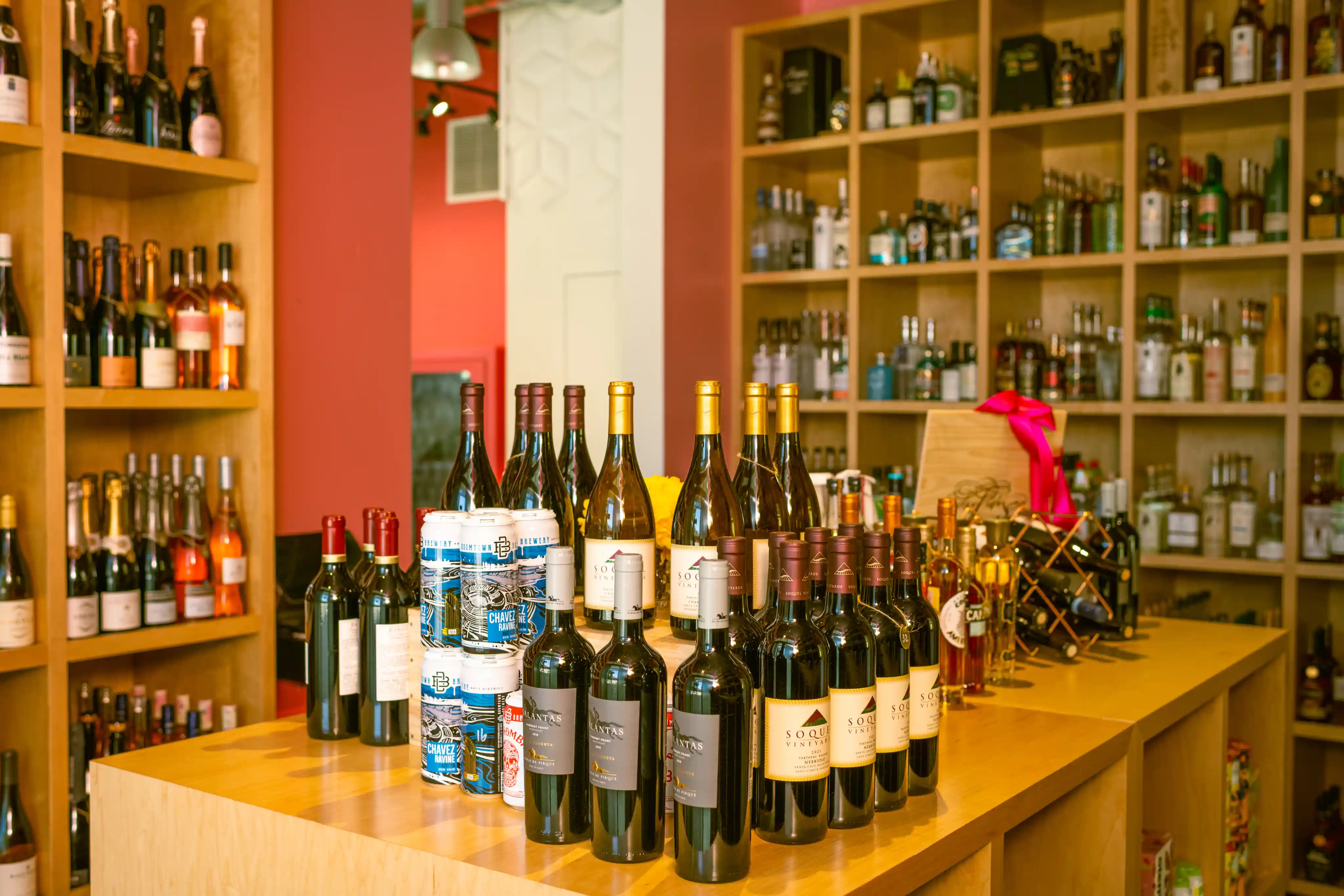 Bottles and cans on a bottle shop counter